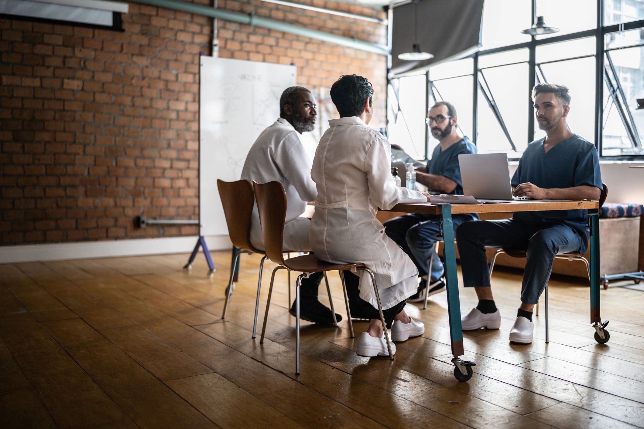 Healthcare professionals meeting representing clinical services