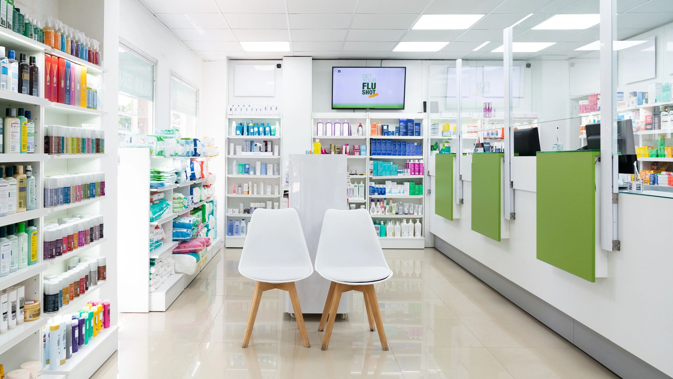 Modern pharmacy interior with shelves and service counter