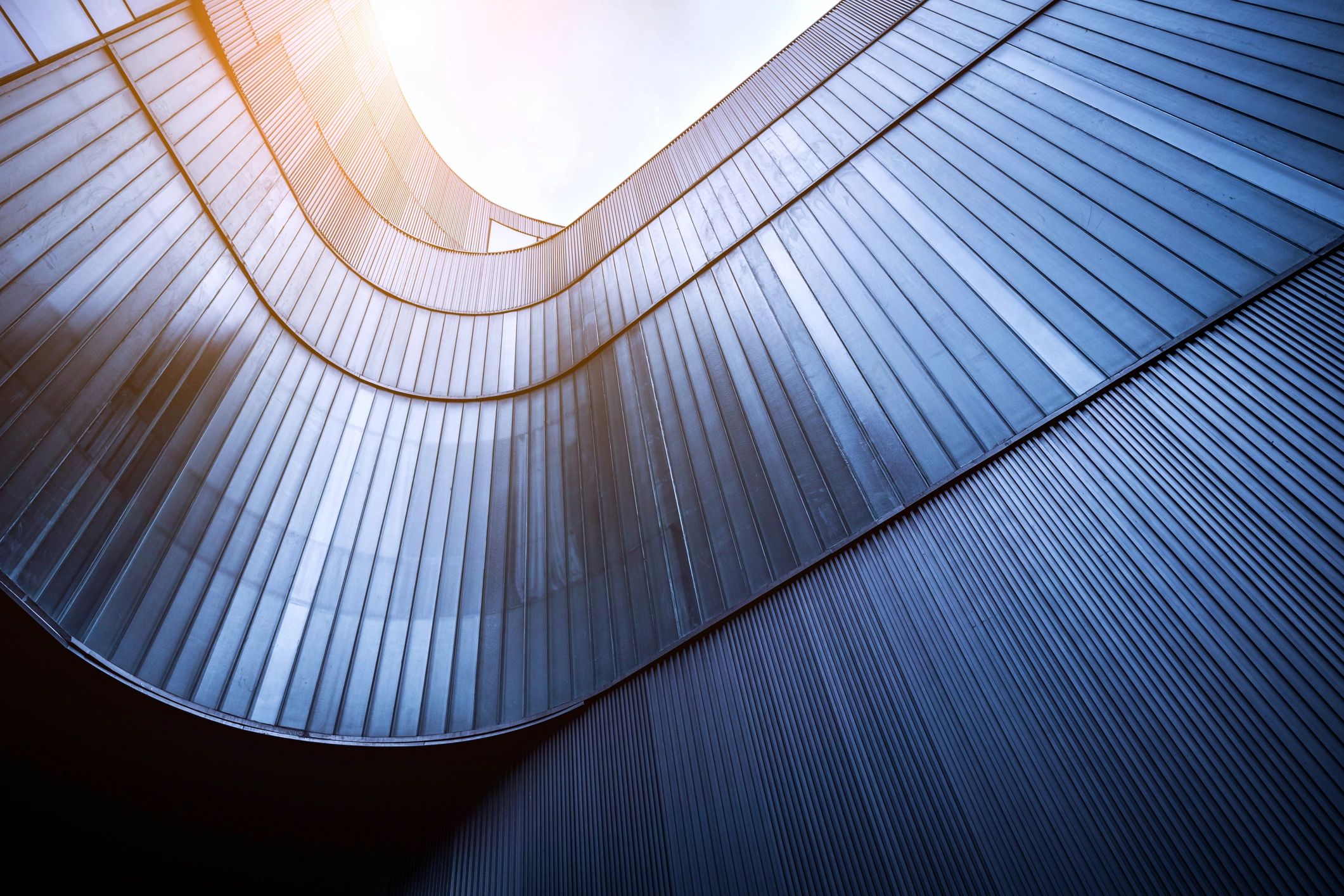 Modern corporate building facade representing corporate updates