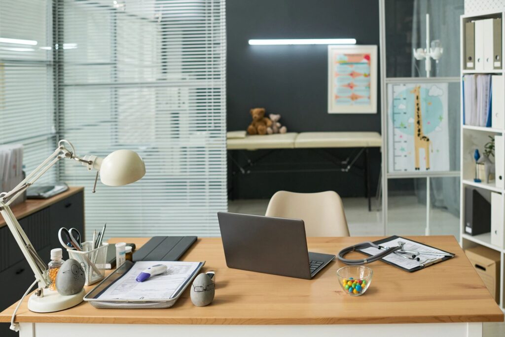 Clinical workspace with digital tools supporting diagnostics and telehealth workflows